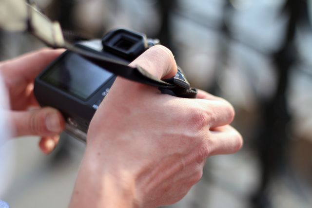 person holding a professional camera